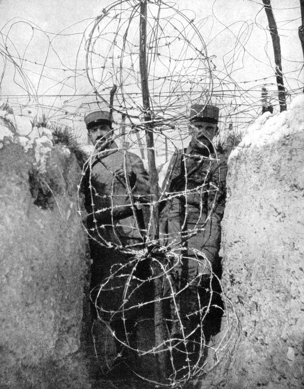 Barbed wire surrounding a French trench, World War I, 1915.