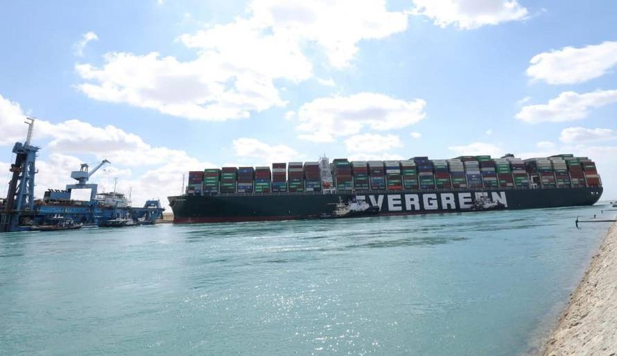 FILE PHOTO: Stranded container ship Ever Given, one of the world's largest container ships, is seen after it ran aground, in Suez Canal