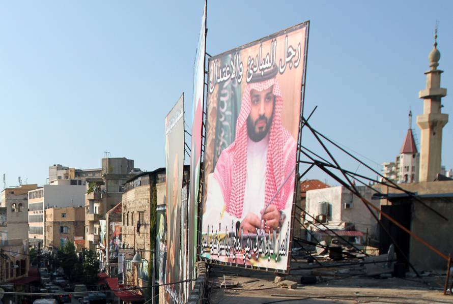 A poster depicting Saudi Crown Prince Mohammed bin Salman is seen in Tripoli