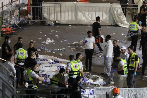 Medics and rescue workers attend to the Lag B