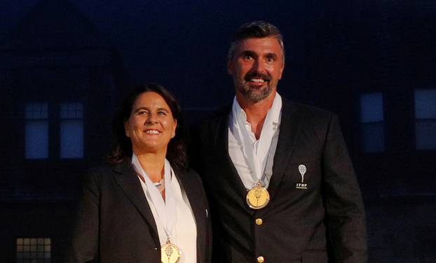 Former tennis players Conchita Martinez of Spain and Goran Ivanisevic of Croatia pose for photographs in Newport