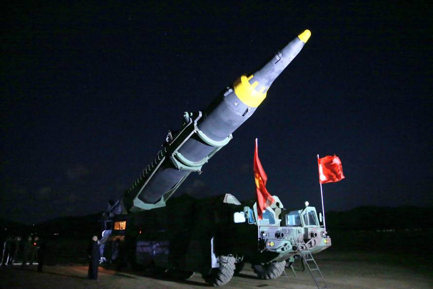 North Korean leader Kim Jong Un inspects the long-range strategic ballistic rocket Hwasong-12 (Mars-12)
