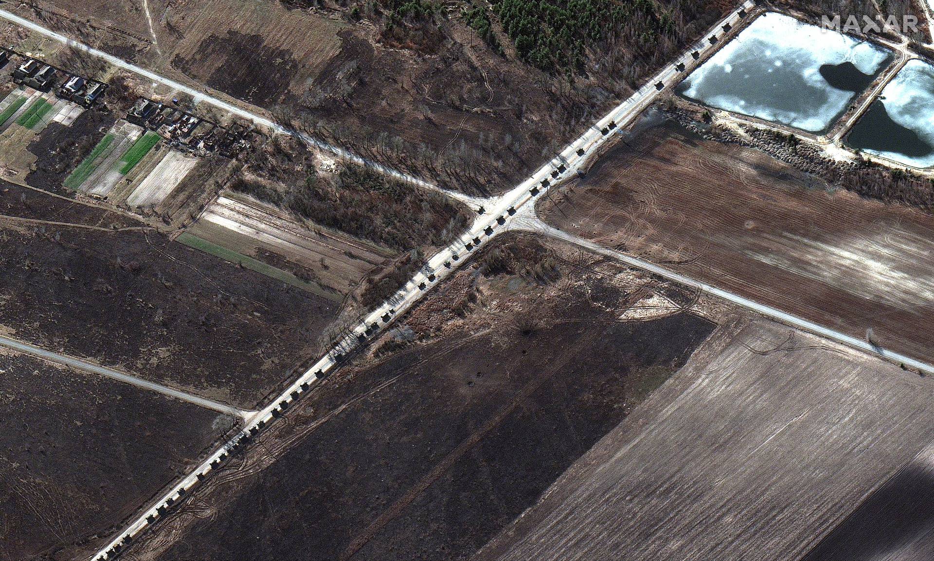 A satellite image shows a military convoy near Invankiv