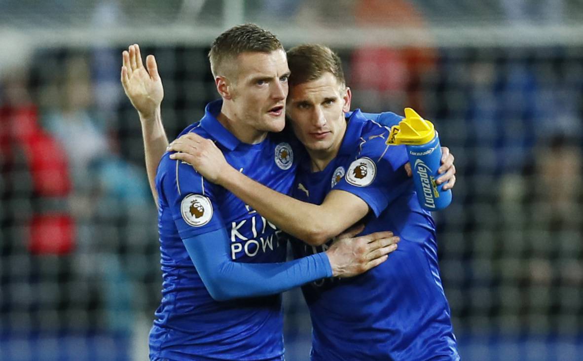Leicester City's Jamie Vardy celebrates after the game with Marc Albrighton