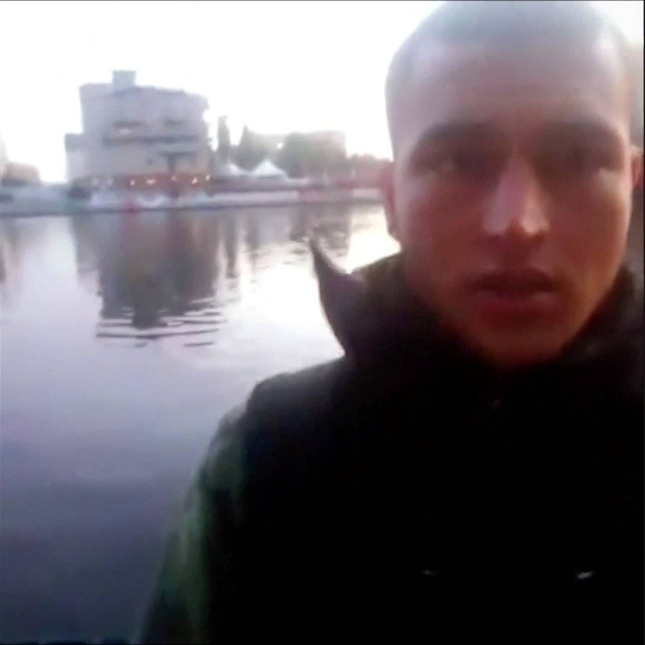 An image grab from a short 'selfie' video clip from a social media website purportedly shows Anis Amri, the Tunisian suspect of the Berlin Christmas market attack, at an unknown location