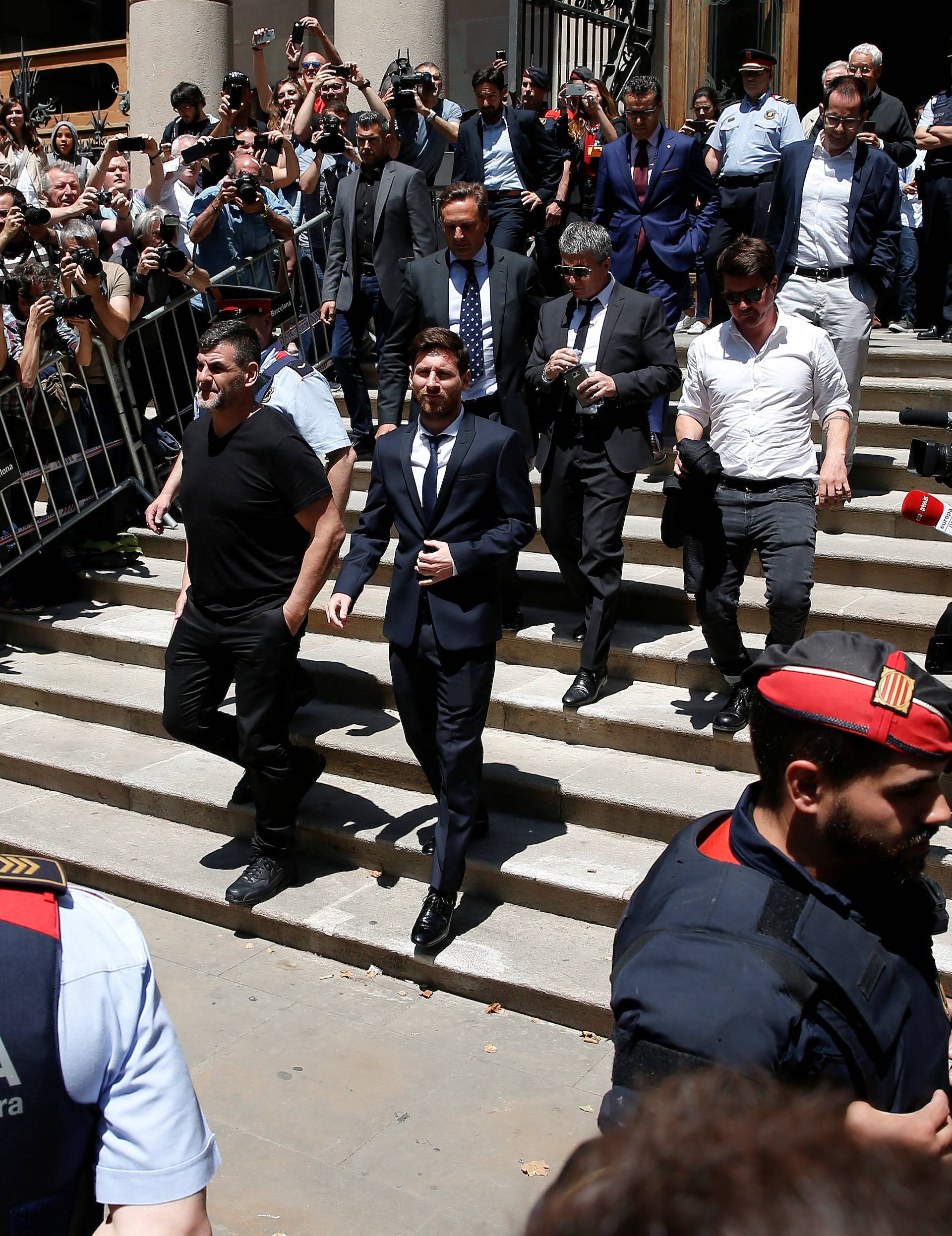 Barcelona's Argentine soccer player Lionel Messi leaves court where he is on trial for tax fraud in Barcelona