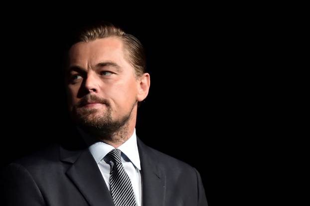 FILE PHOTO: US actor Leonardo DiCaprio looks on prior to speaking on stage during the Paris premiere of the documentary film "Before the Flood" in Paris