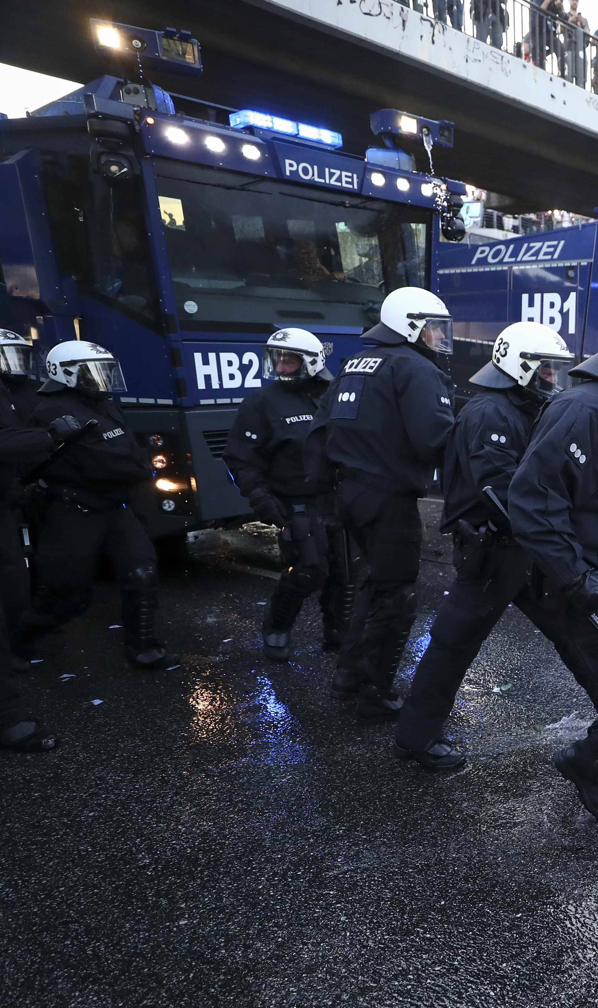 German riot police use water cannons against protesters during the demonstrations during the G20 summit in Hamburg