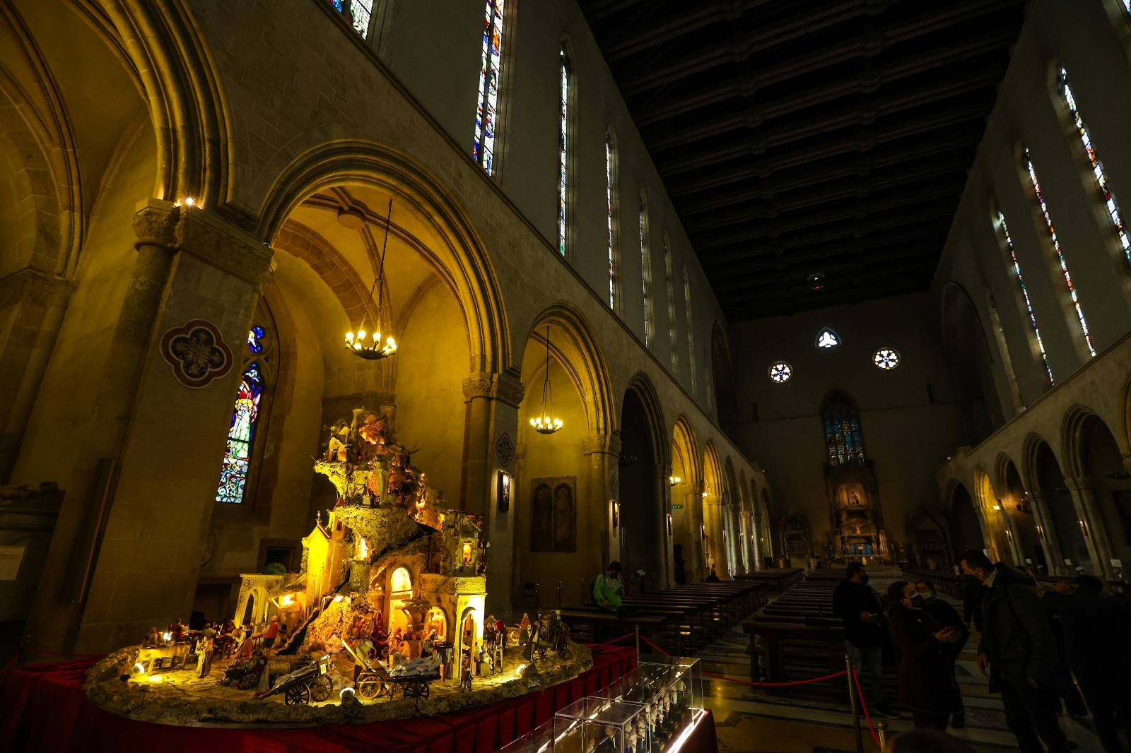 A large nativity scene whose base is also made of pizza to celebrate Christmas in the Basilica of Santa Chiara