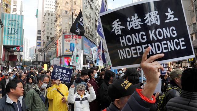 Pro-independence supporters take part in an annual New Year's Day march in Hong Kong