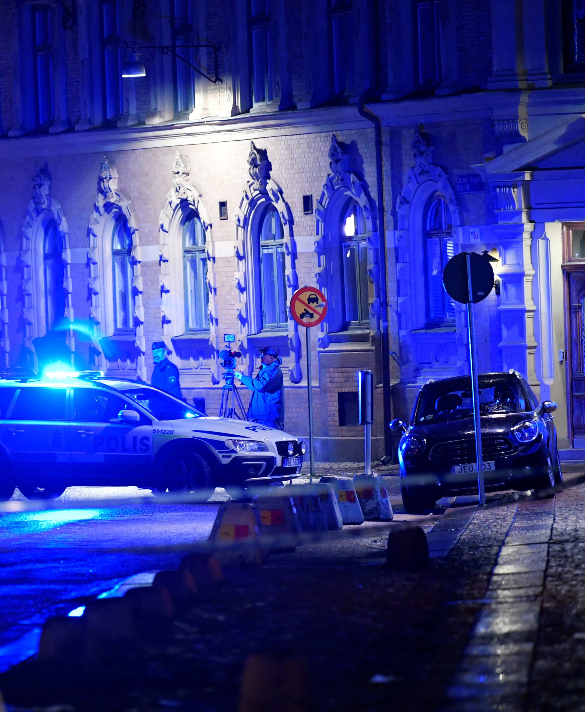 Police is seen at the site of an attack near a synagogue in Gothenburg