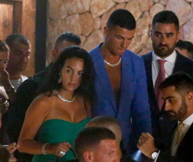 EXCLUSIVE: Cristiano Ronaldo and his wife Georgina Rodriguez are seen dancing, hugging and kissing on a night out with friends