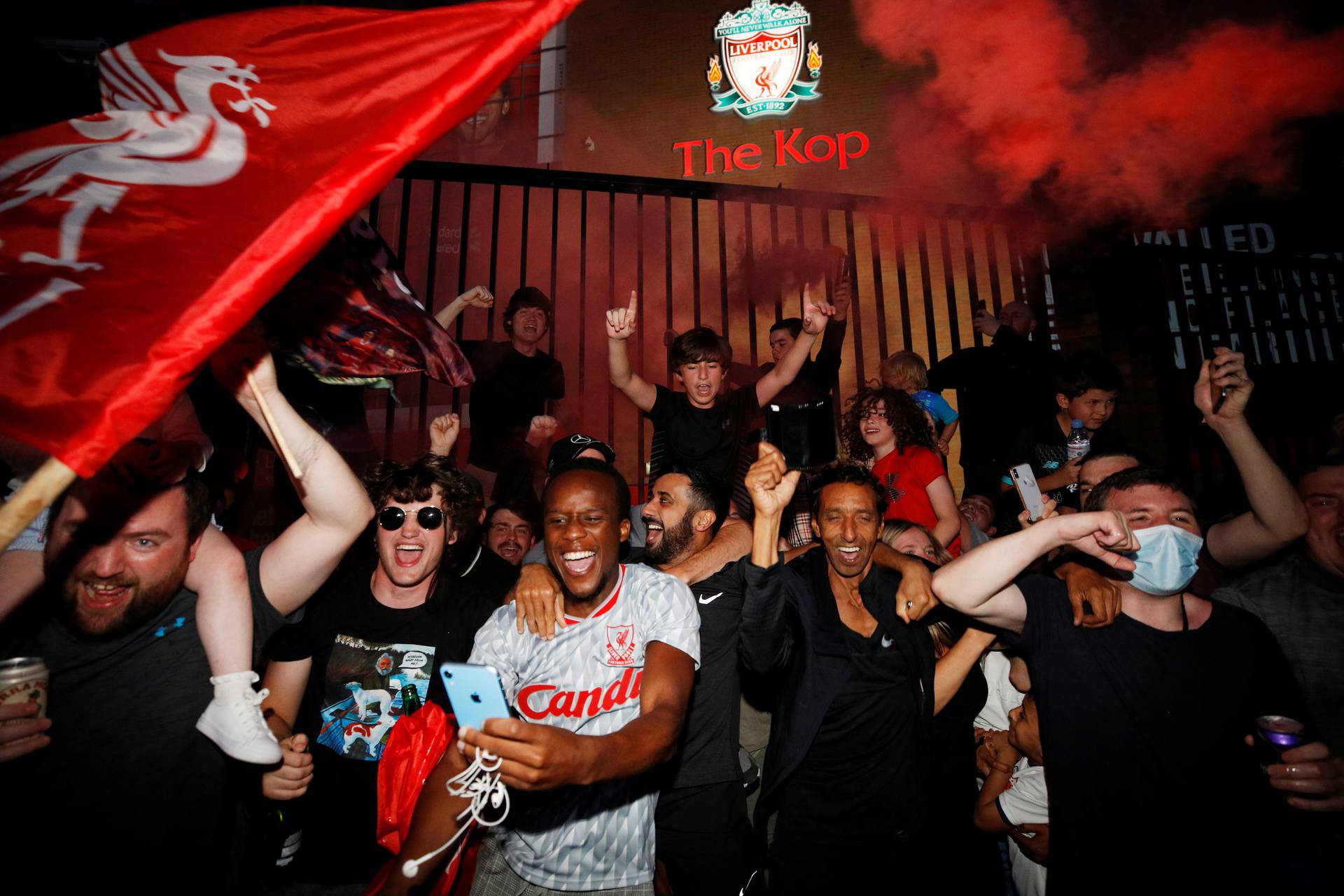 Premier League - Liverpool fans celebrate winning the Premier League