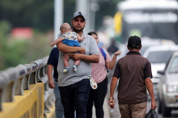 Colombian soldiers patrol the border between Venezuela and Colombia