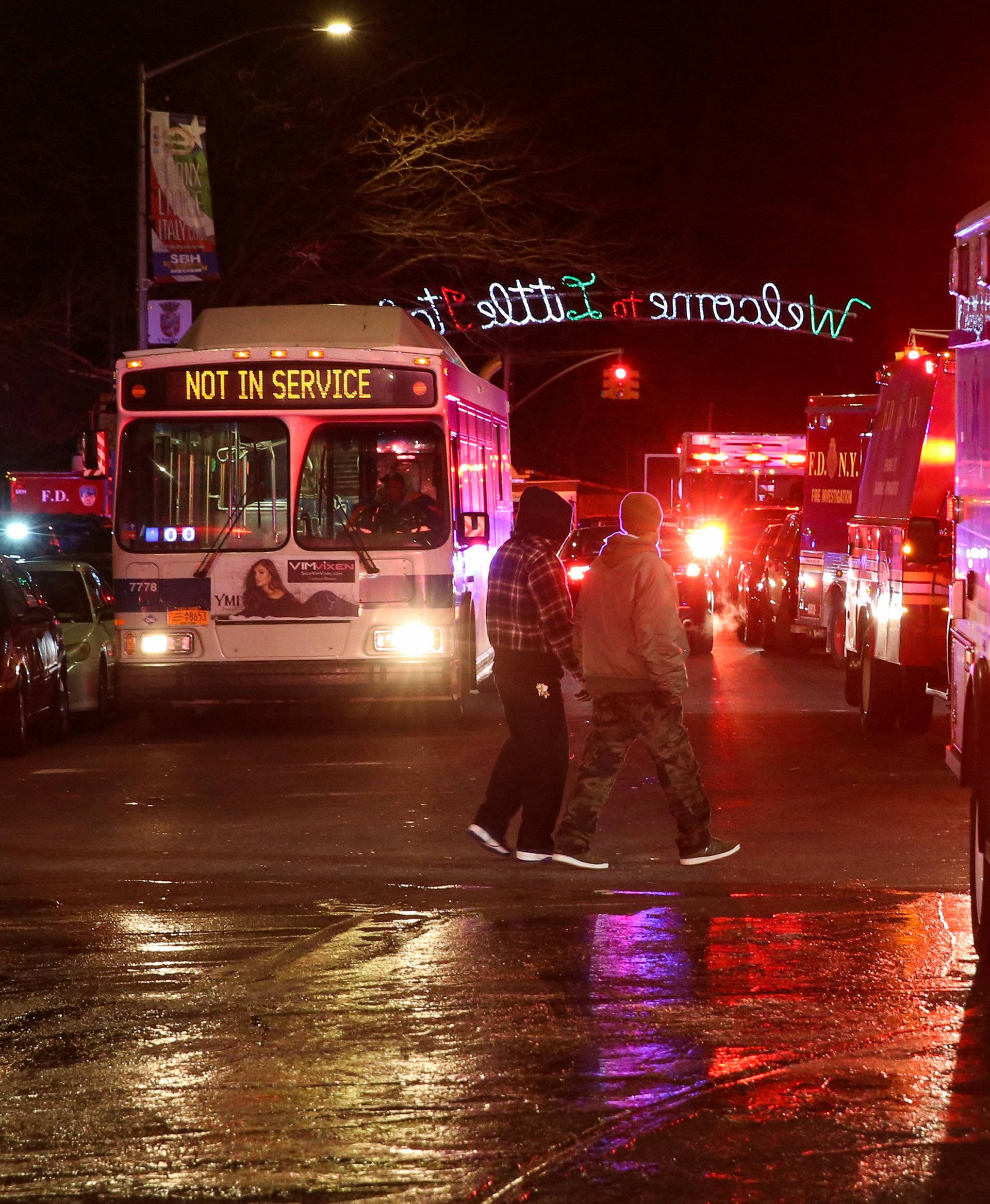 FDNY personnel work on the scene of an apartment fire in New York