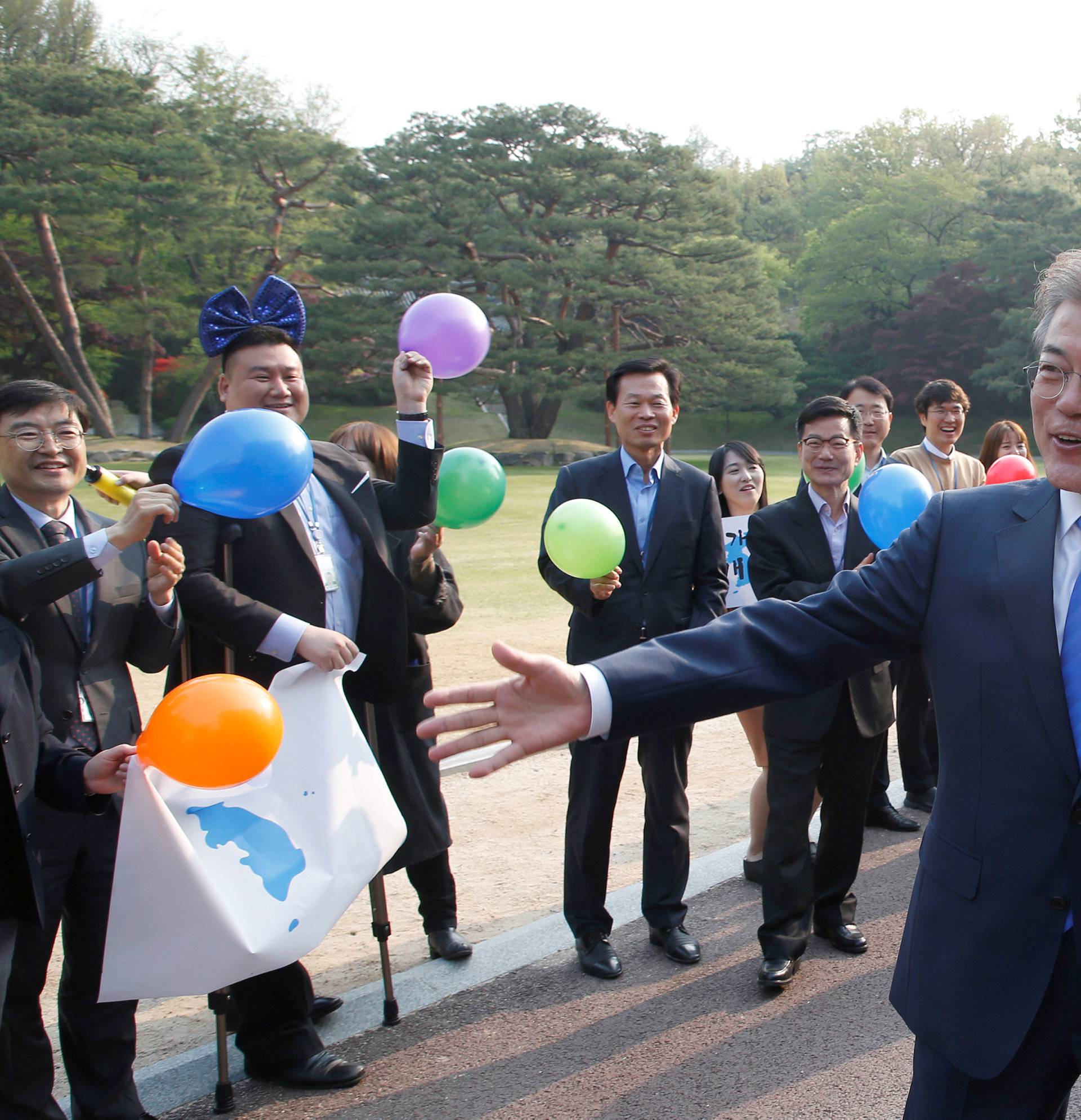 South Korean President Moon Jae-in gestures at the truce village of Panmunjom