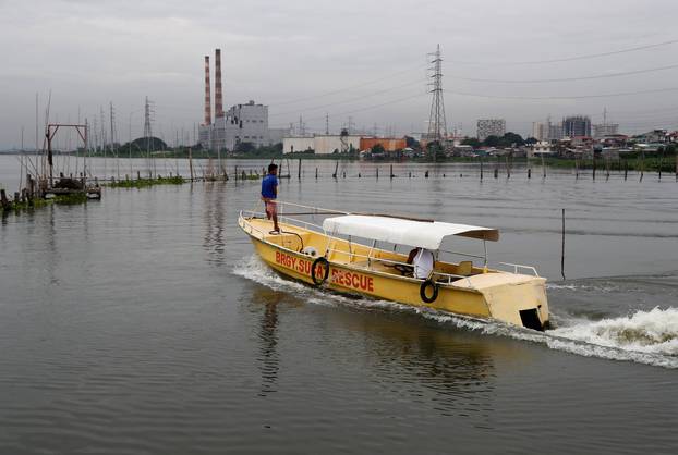 A rescue boat is pictured near the shoreline of Laguna de Bay, before Typhoon Mangkhut hits the main island of Luzon, in Muntinlupa, Metro Manila