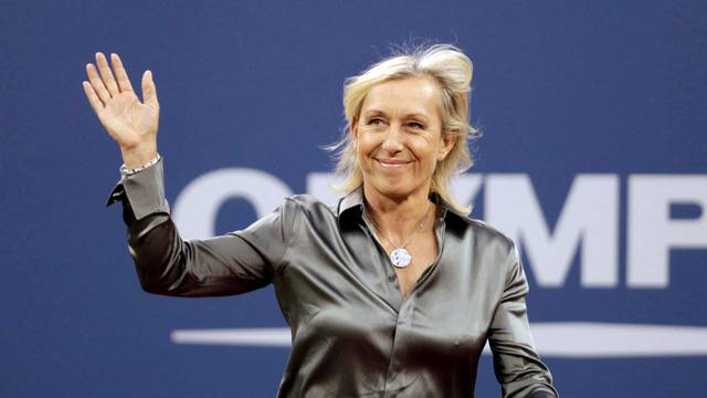 FILE PHOTO: Former tennis star Martina Navratilova waves to the crowd as she is honored during the opening ceremony of the U.S. Open tennis tournament in New York