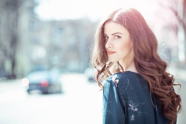 Modern girl and spring blossom