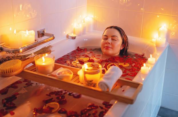 Young,Woman,Enjoying,Spiritual,Aura,Cleansing,Rose,Flower,Bath,With