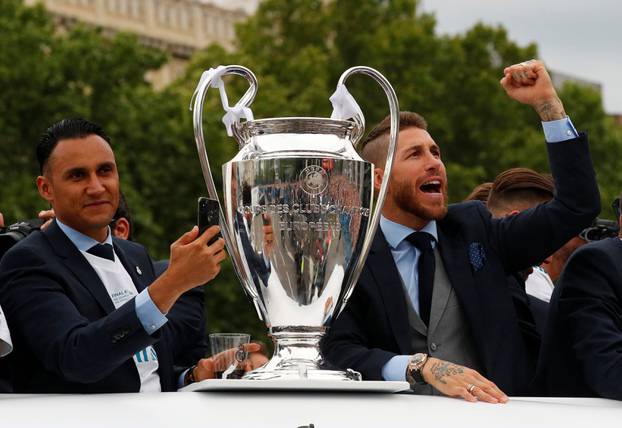 Real Madrid celebrate winning the Champions League Final