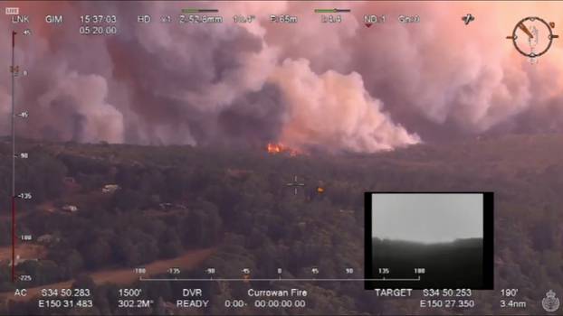Aerial image shows plumes of smoke rising from bushfires at Clyde Mountain, New South Wales