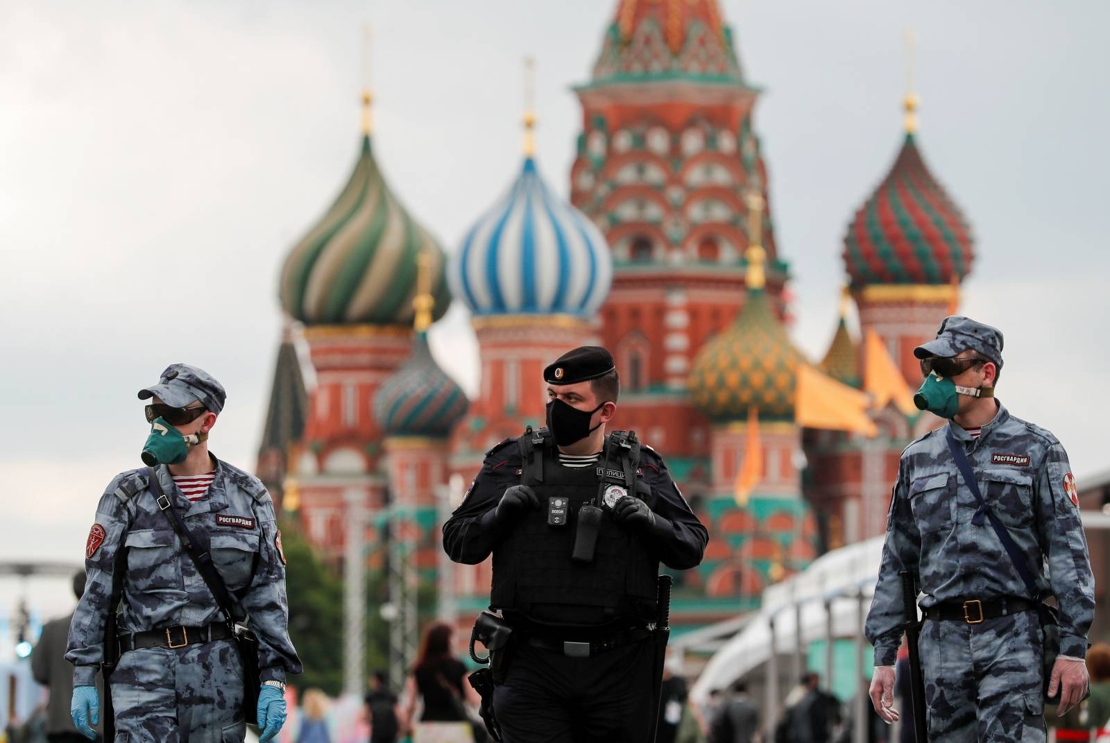 Russian law enforcement officers work at the annual Red Square Book Fair in central Moscow