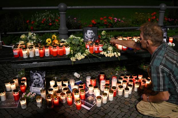 People gather to commemorate of Charlie Kirk in front of the Embassy of the United States in Berlin