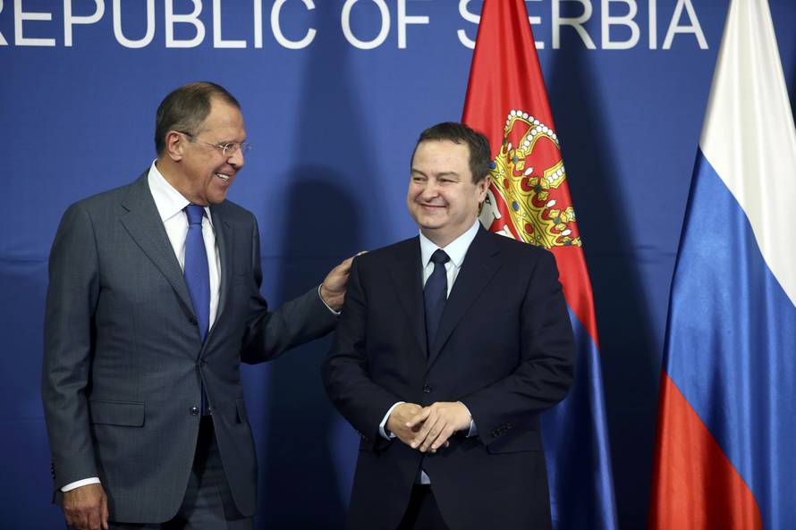 Serbian Foreign Minister Dacic and his Russian counterpart Lavrov arrive for a press conference in Belgrade