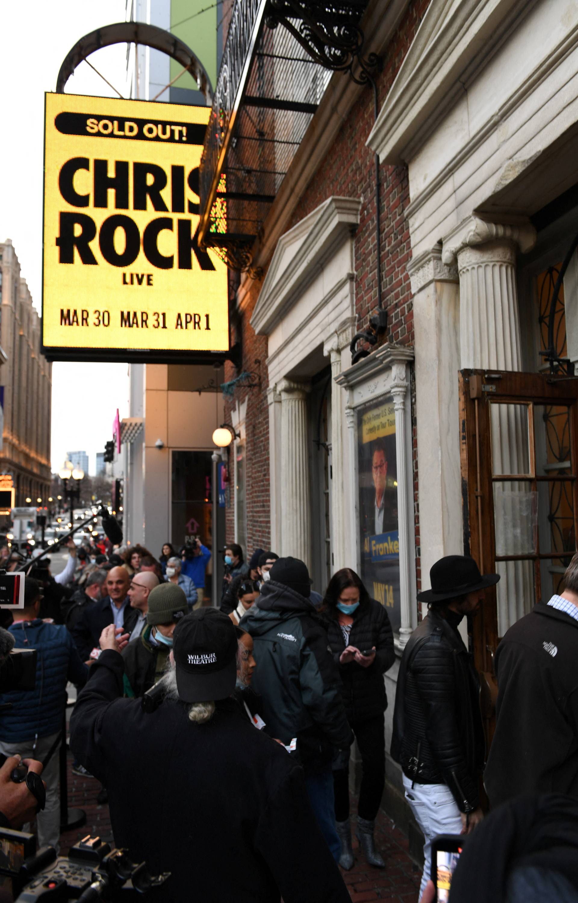 Actor and comedian Chris Rock performs in Boston