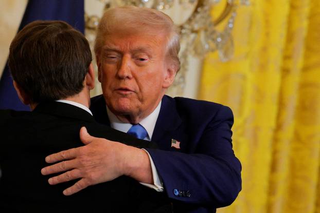 U.S. President Donald Trump and French President Emmanuel Macron attend a press conference at the White House in Washington