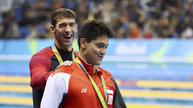 Swimming - Men's 100m Butterfly Victory Ceremony