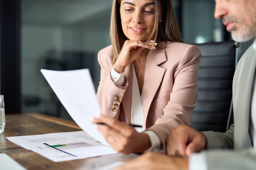 Business,Woman,Lawyer,Attorney,Showing,Document,To,Man,Client,Providing