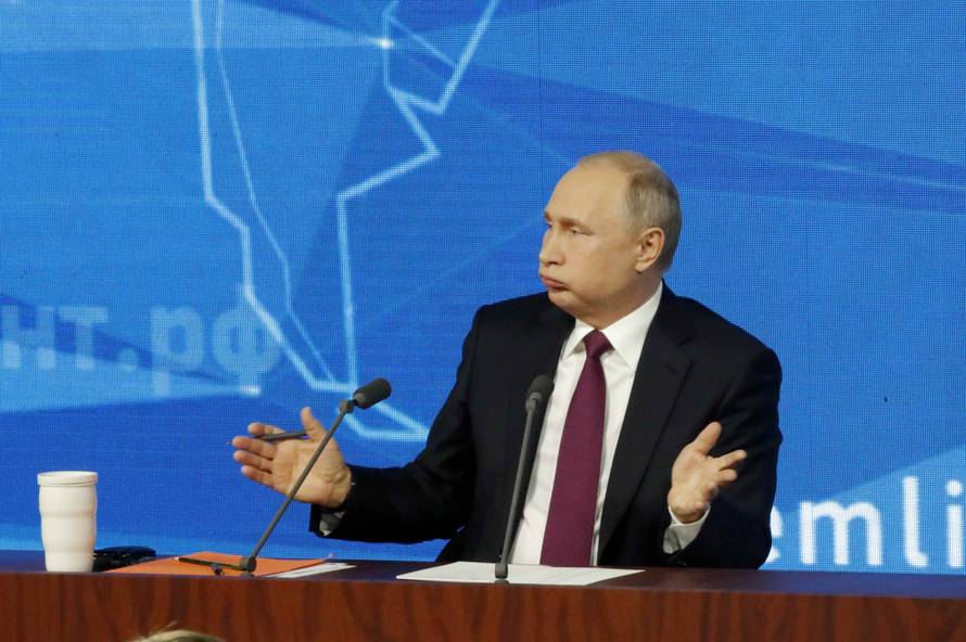 Russian President Putin speaks during annual news conference in Moscow