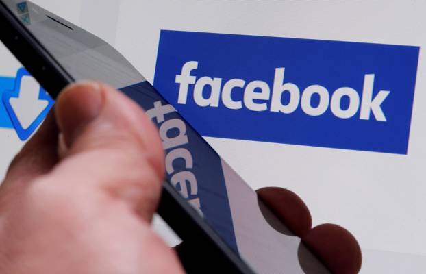 FILE PHOTO: The Facebook logo is displayed on the company