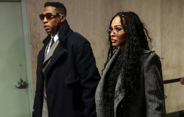 Actor Jonathan Majors arrives with Meagan Good for the jury selection in his assault and harassment case at Manhattan Criminal Court in New York City