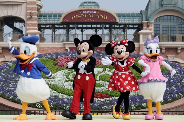 Disney characters Mickey Mouse, Minnie Mouse, Donald Duck and Daisy Duck are seen at Shanghai Disney Resort as the Shanghai Disneyland theme park reopens following a shutdown due to the coronavirus disease (COVID-19) outbreak, in Shanghai