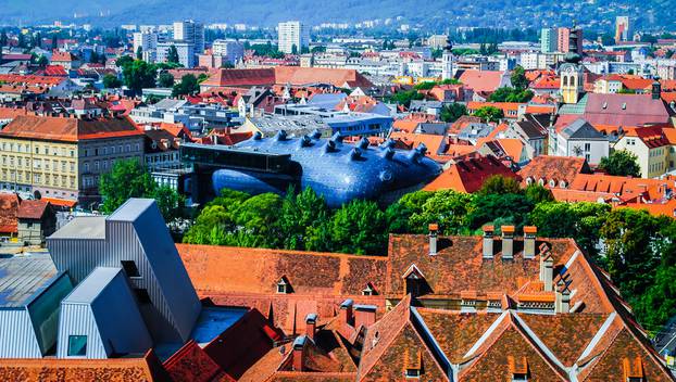 View,Of,Graz,City,With,Kunsthaus,,Buildings,And,Roofs,From