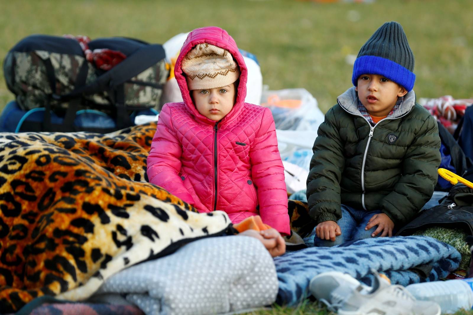 Migrant children are seen near Turkey's Pazarkule border crossing with Greece's Kastanies, near Edirne