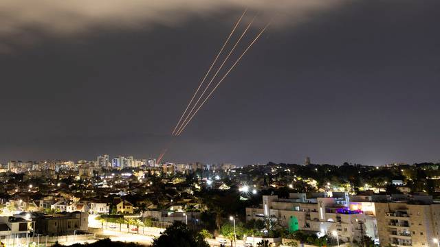 An anti-missile system operates after Iran launched drones and missiles towards Israel, as seen from Ashkelon