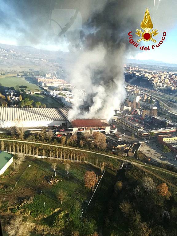 A general view from helicopter shows a large fire that has broken out in a municipal rubbish dump on the northern outskirts of Rome