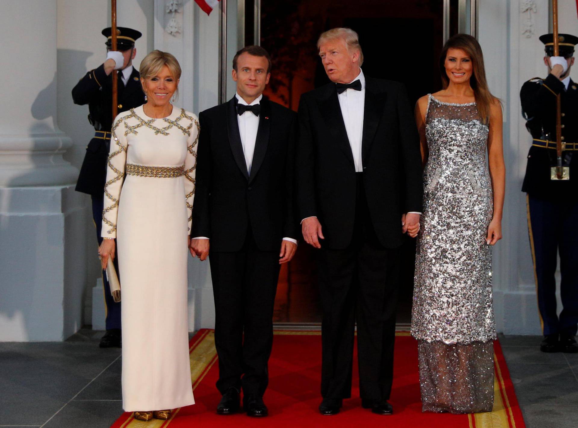 U.S. President Trump and first lady Melania welcome French President Macron and his wife for a State Dinner at the White House in Washington