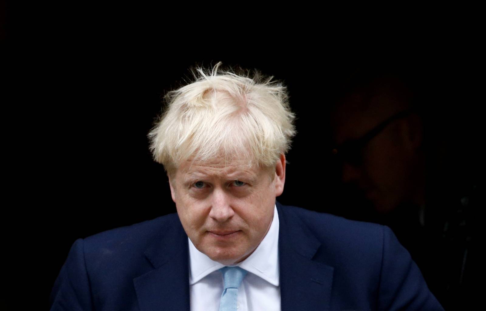 FILE PHOTO: British Prime Minister Boris Johnson leaves Downing Street in London