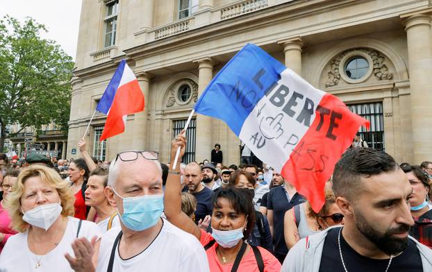 FILE PHOTO: Protest against the new COVID-19 measures, in Paris
