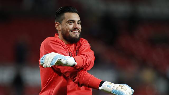 Manchester United's Sergio Romero warms up before the match