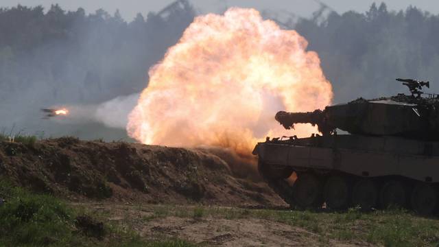 FILE PHOTO: Polish Leopard 2PL tank fires during Defender Europe 2022 military exercise at the military range in Bemowo Piskie
