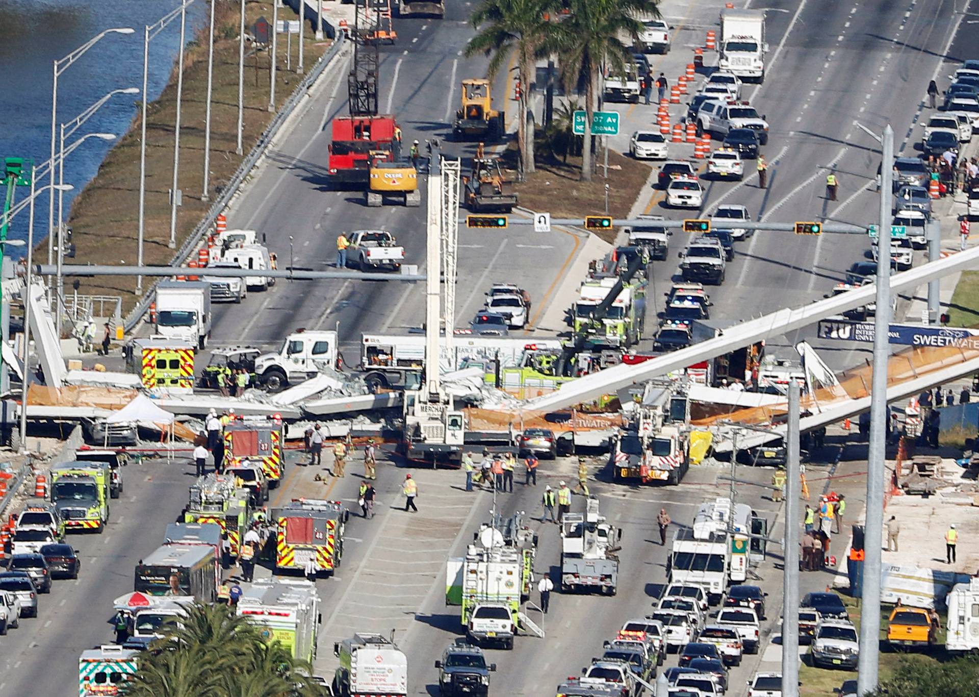 Aerial view shows a pedestrian bridge collapsed at Florida International University in Miami