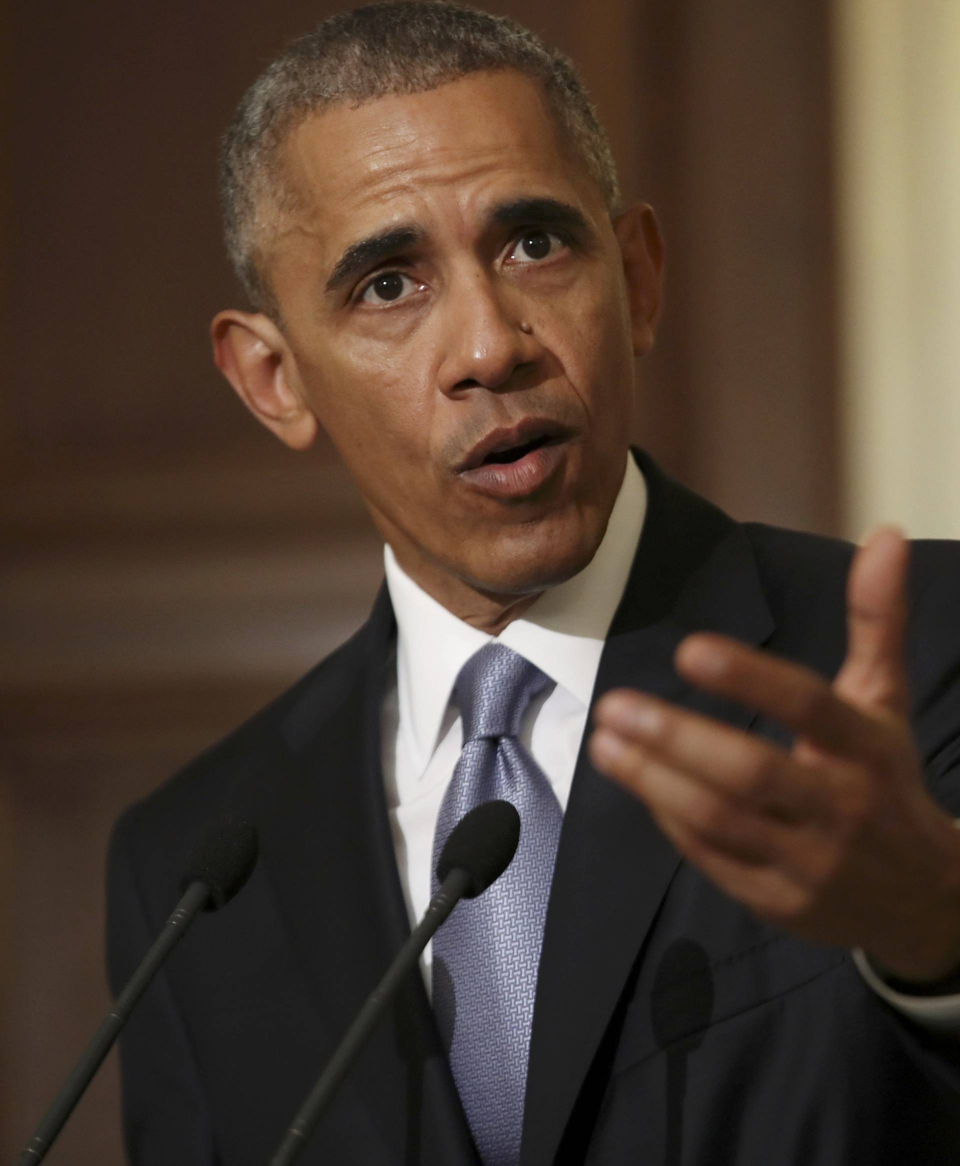 U.S President Obama addresses journalists during a joint news conference with Greek PM Tsipras in Athens