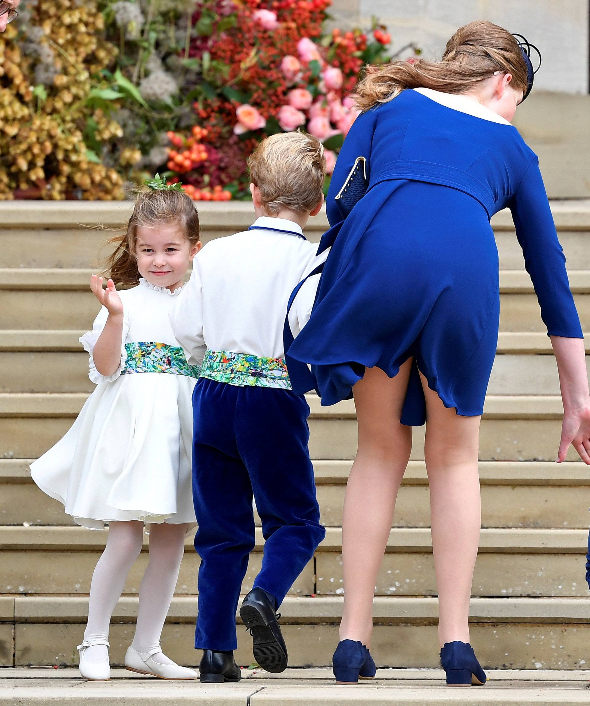 Princess Charlotte of Cambridge arrives with bridesmaids and pageboys for the royal wedding of Princess Eugenie and Jack Brooksbank at St George's Chapel in Windsor Castle, Windsor