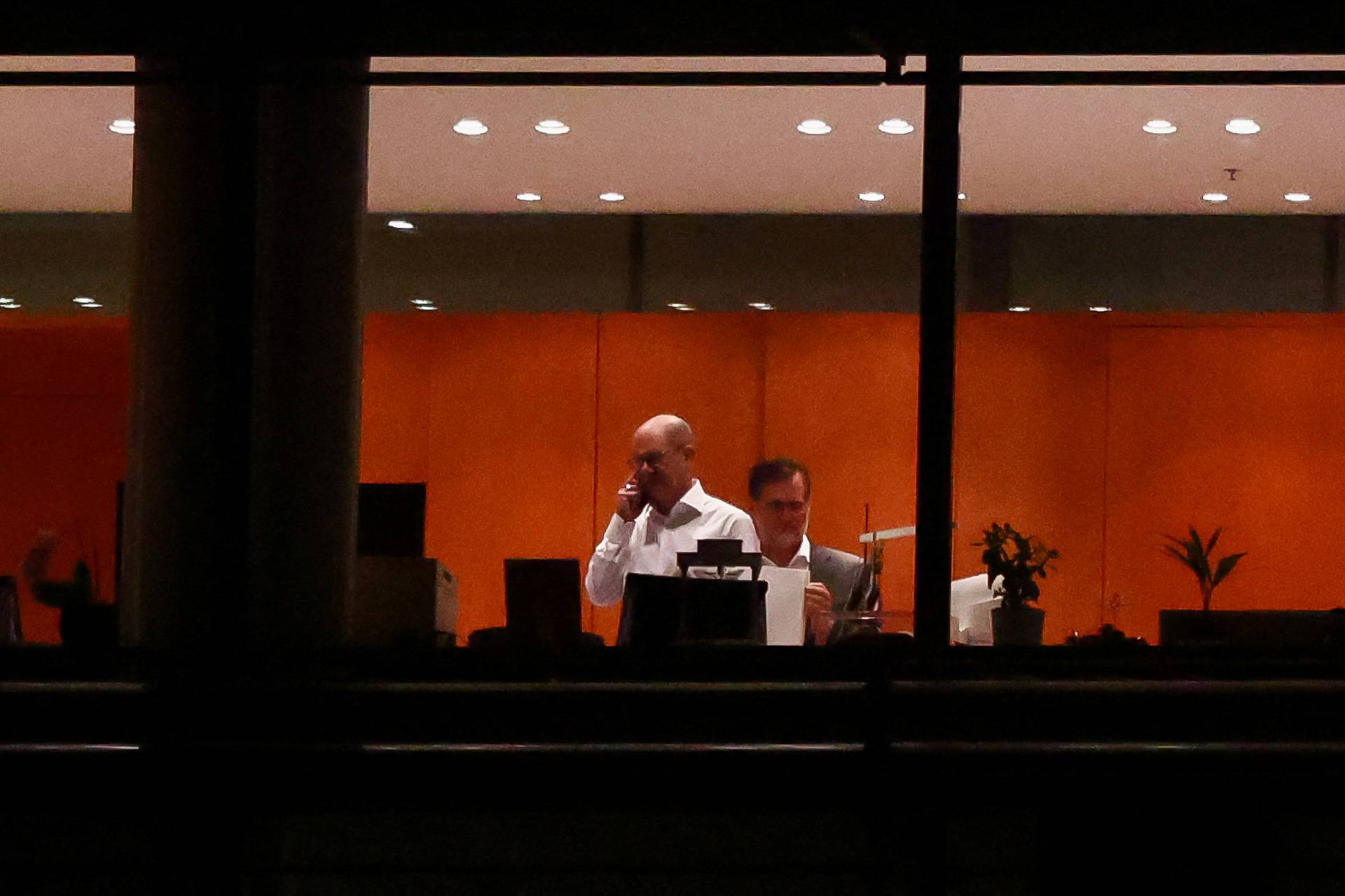 German Chancellor Scholz is seen in the Chancellor's office before a coalition meeting, in Berlin